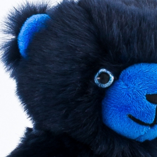 Peluche ours yeux bleu La Pelucherie