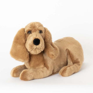Chien cocker allongé, vue de face, réaliste, magasin peluche, La Pelucherie